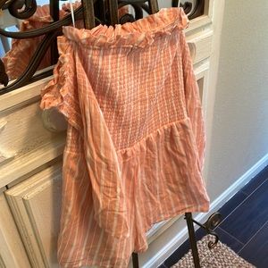 A loose, one-piece used once